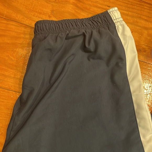 Large Nike navy blue white side stripe pockets split side athletic track pants - Picture 9 of 16